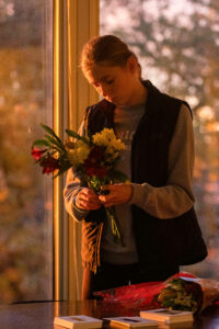 Photo of Madison Prokosch preparing flowers