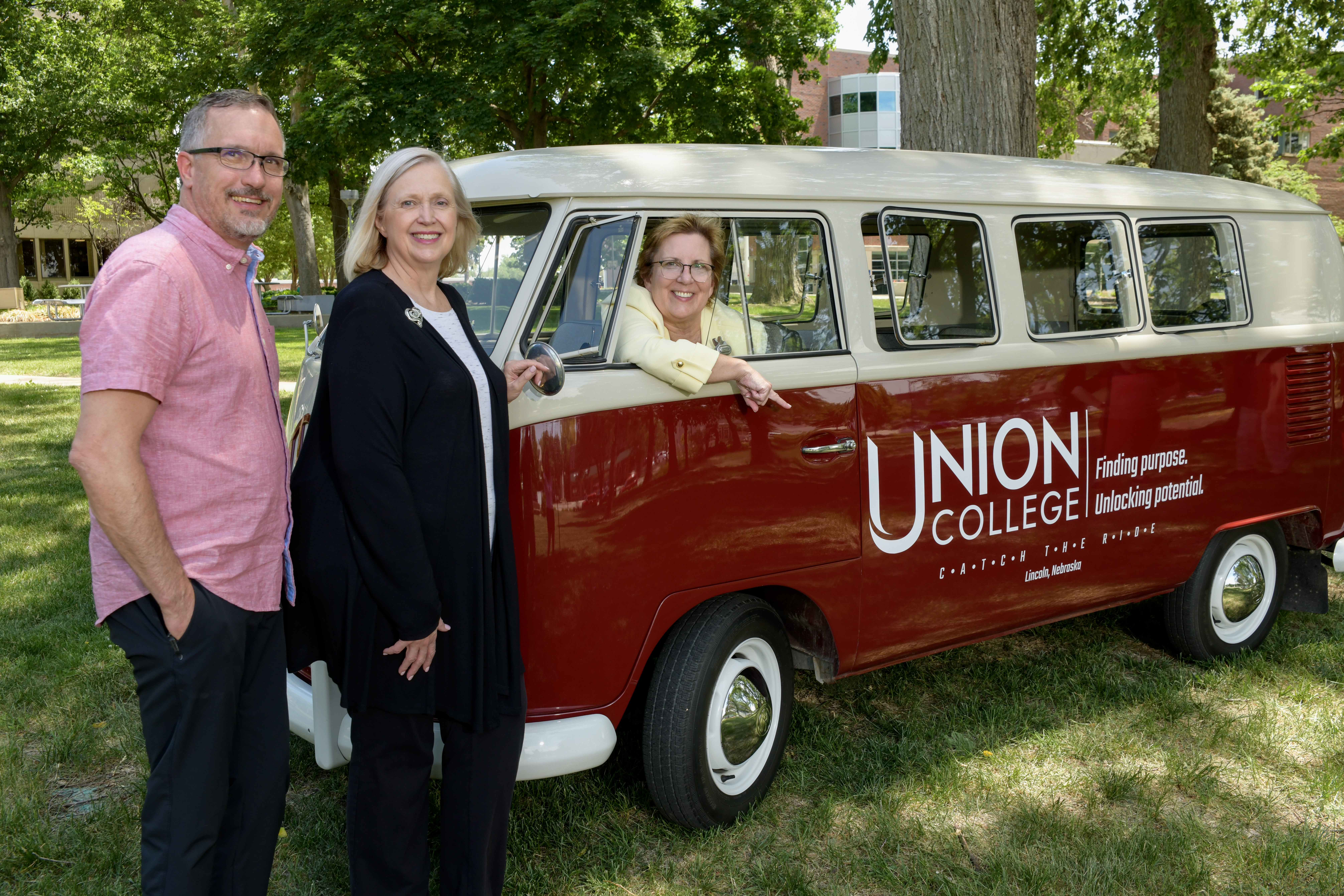 Ken Farrow, LuAnn Davis and Vinita Sauder with Union’s VW bus.