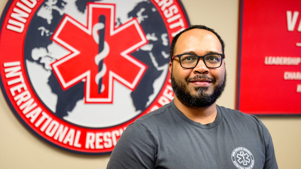 Photo of Jamie Rahming in the International Rescue and Relief offices