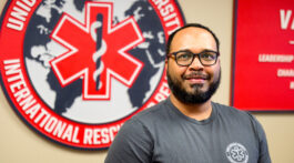 Photo of Jamie Rahming in the International Rescue and Relief offices