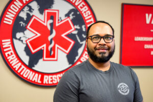 Photo of Jamie Rahming in the International Rescue and Relief offices