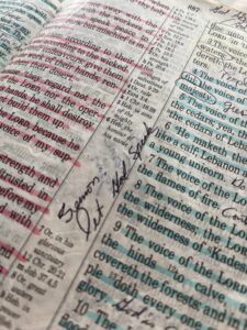 Margin note in a Bible with words, Sermon: Let God Speak